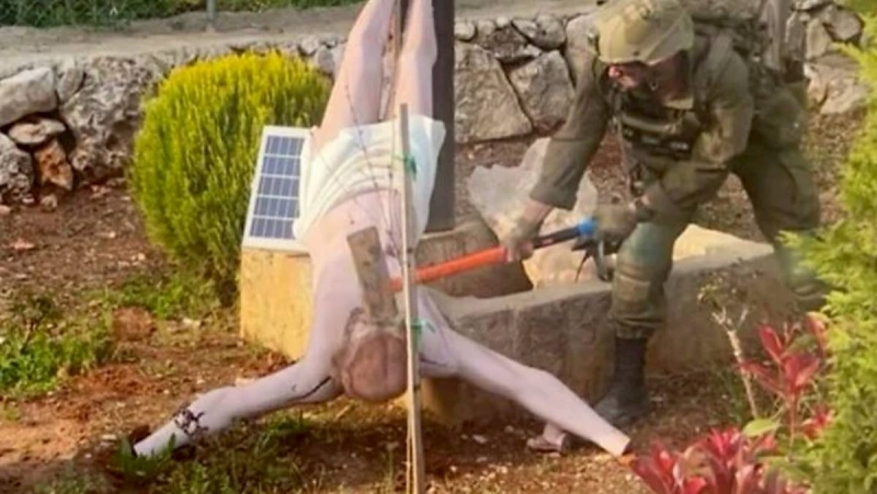 以色列士兵將耶穌像倒掛「砍頭」引眾怒　以軍：確有此事